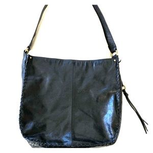 100% authentic genuine leather. Brand name Hobo
